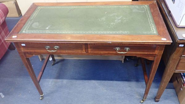 AN EDWARDIAN  MAHOGANY WRITING TABLE, WITH GREEN LEATHER SURFACE