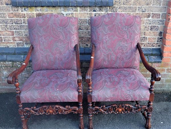 A PAIR OF MAHOGANY FRAMED OPEN ARMCHAIRS