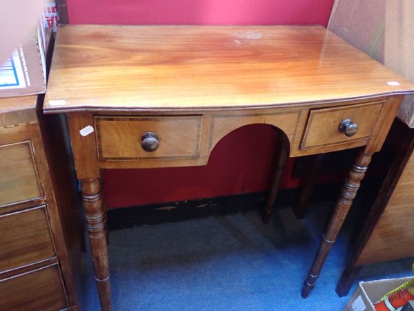 A REGENCY MAHOGANY BOWFRONT SIDE TABLE