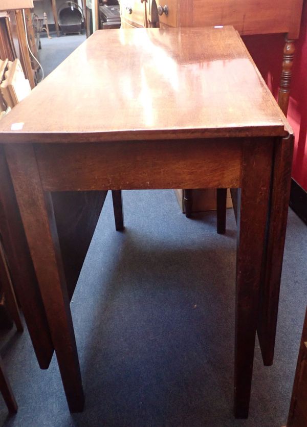 A GEORGE III RECTANGULAR DROP-LEAF DINING TABLE