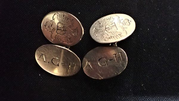 A PAIR OF GOLD COLOURED METAL CUFFLINKS