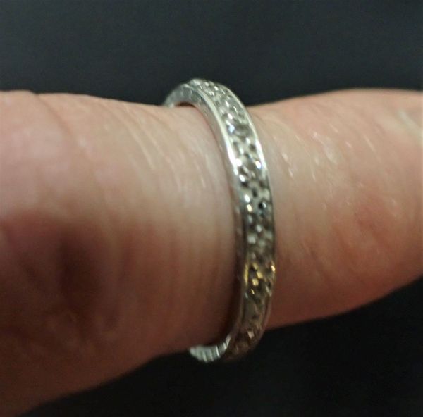 AN EDWARDIAN PLATINUM FULL ETERNITY RING