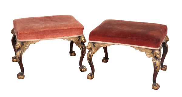 A PAIR OF GEORGE II STYLE MAHOGANY AND PARCEL GILT STOOLS