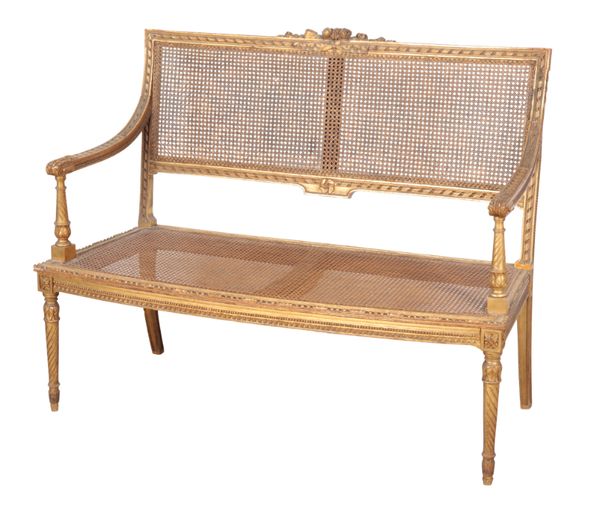 A LOUIS XVI STYLE GILTWOOD SETTEE