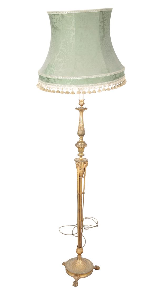 AN EMPIRE STYLE GILT METAL STANDARD LAMP