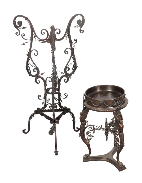 AN EDWARDIAN BRONZE JARDINIERE STAND