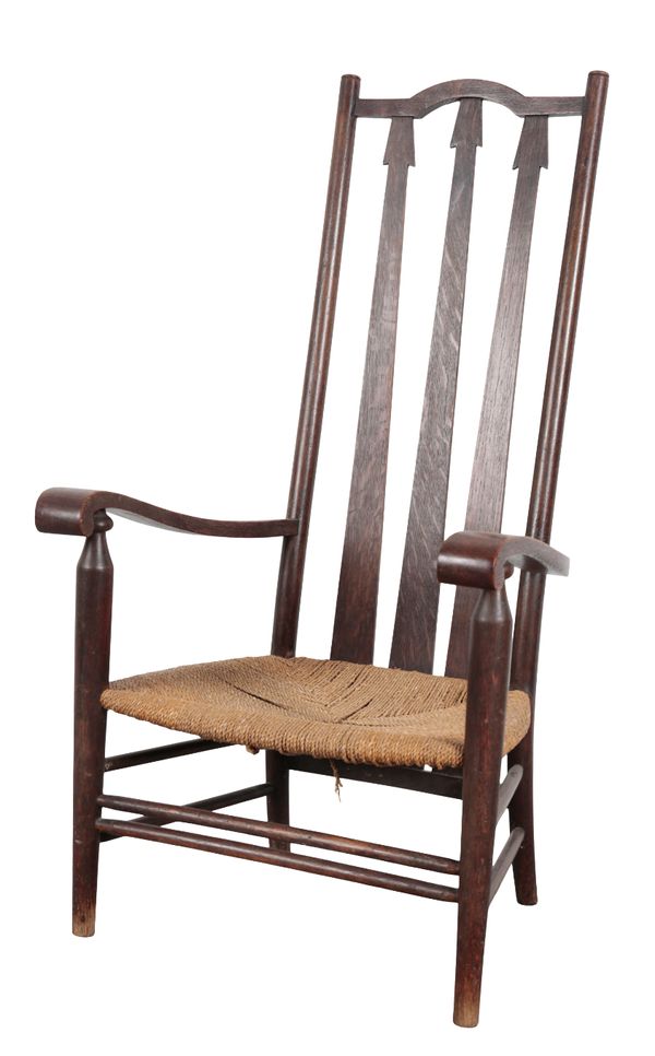 AN ARTS & CRAFTS OAK ARMCHAIR