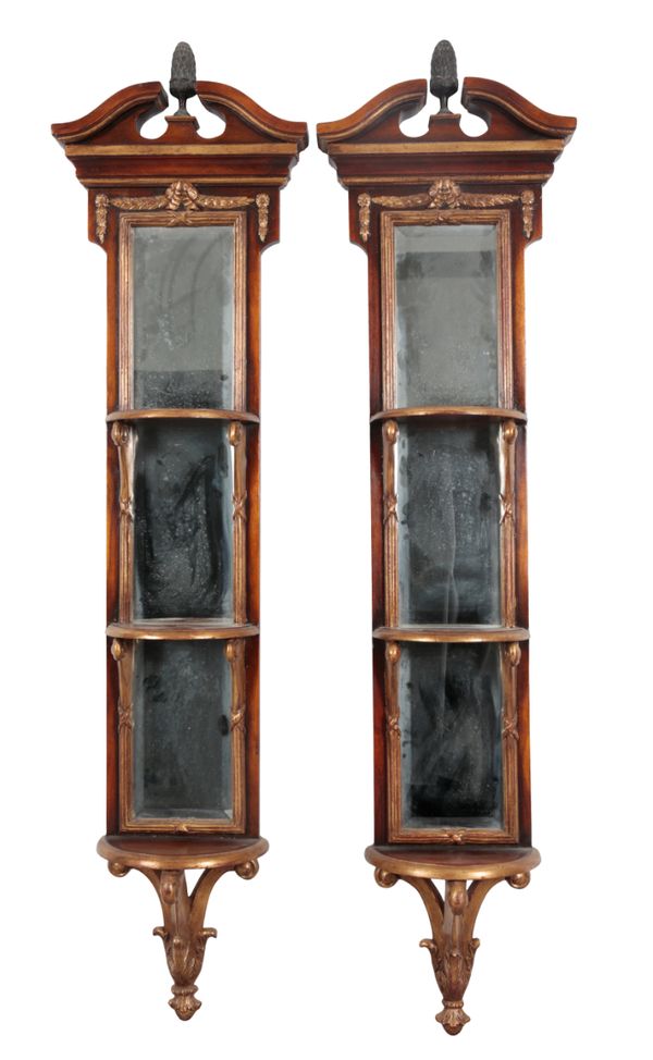 A PAIR OF GEORGE II STYLE MAHOGANY, PARCEL-GILT AND MIRROR-BACK WALL SHELVES