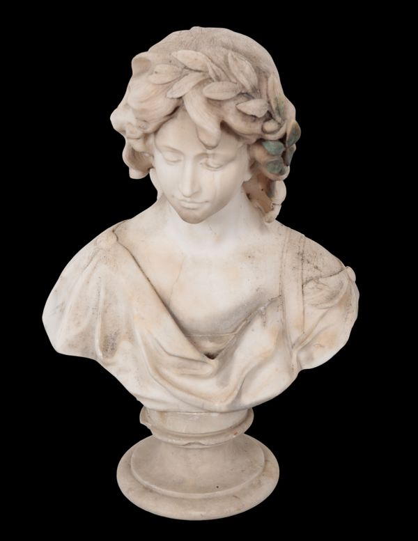 A MARBLE BUST OF A YOUNG GIRL