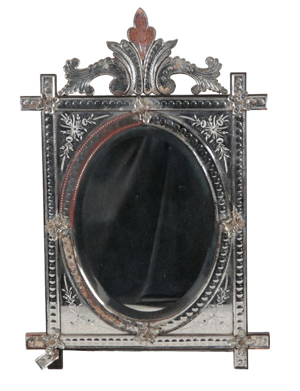 A VENETIAN GLASS MIRROR