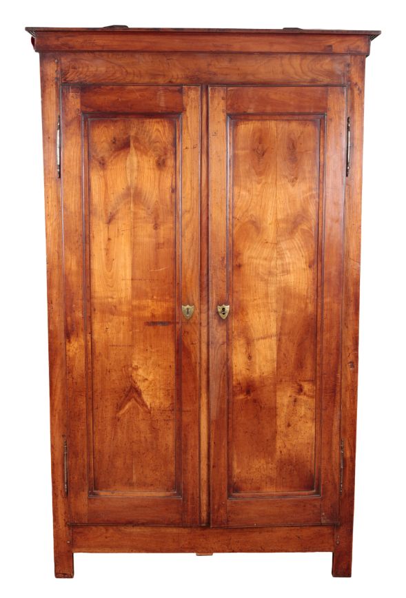 A FRENCH FRUITWOOD ARMOIRE