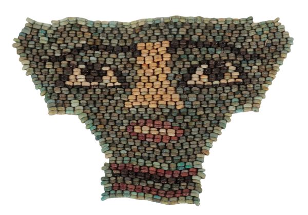 AN EGYPTIAN BEADWORK FRAGMENT