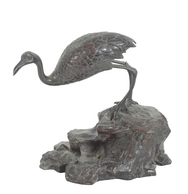 A BRONZE MODEL OF A FLAMINGO