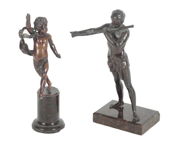 A BRONZE FIGURE OF A DANCING BOY