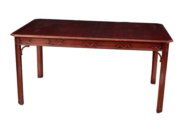 A GEORGE III STYLE MAHOGANY DINING TABLE