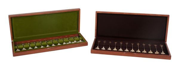 JOHN PINCHES - TWO CASED SETS OF TWELVE COMMEMORATIVE SILVER SPOONS