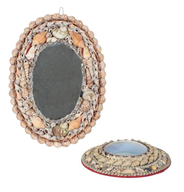 A SHELL MOUNTED MIRROR