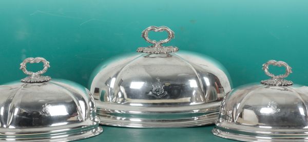 A SET OF THREE 19TH CENTURY SILVER PLATED GRADUATED OVAL CLOCHES