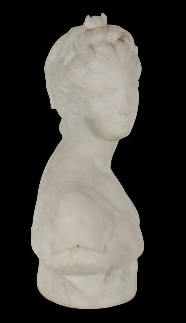 A CARVED STONE BUST OF A GREEK GODDESS