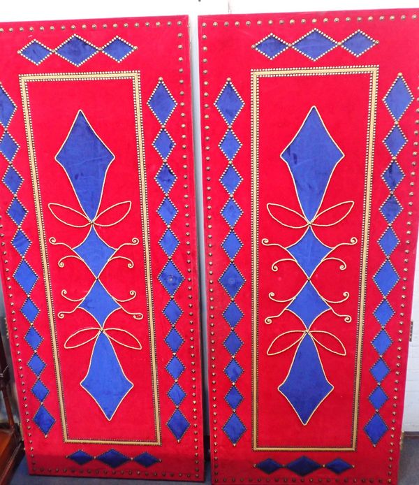 A SUBSTANTIAL PAIR OF DOORS, COVERED WITH BLUE AND RED VELVET
