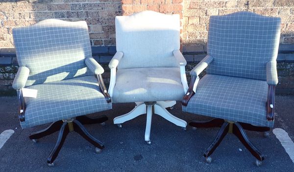 THREE REPRODUCTION SWIVEL DESK CHAIRS