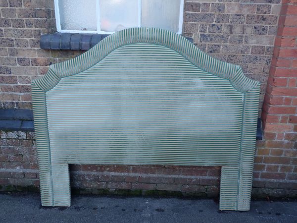 A GREEN STRIPED VELVET UPHOLSTERED  DOUBLE HEADBOARD