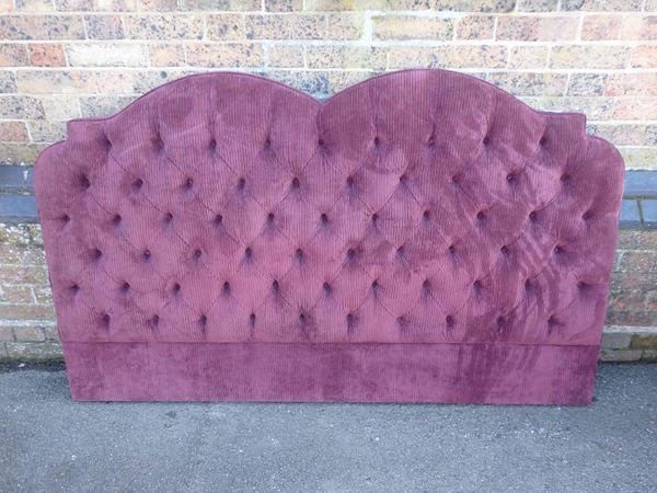 A  BUTTONED PLUM JUMBO CORD UPHOLSTERED DOUBLE HEADBOARD