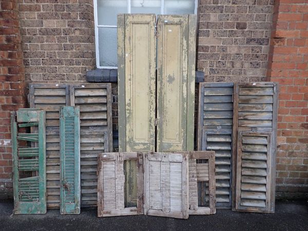 A COLLECTION OF WINDOW SHUTTERS
