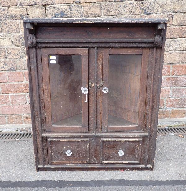 A EUROPEAN PAINTED PINE HANGING CORNER CUPBOARD