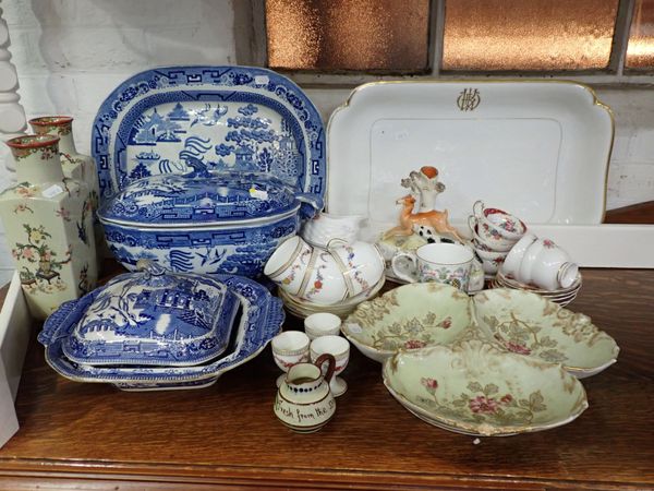 A LARGE 19TH CENTURY WILLOW PATTERN TUREEN AND LADLE