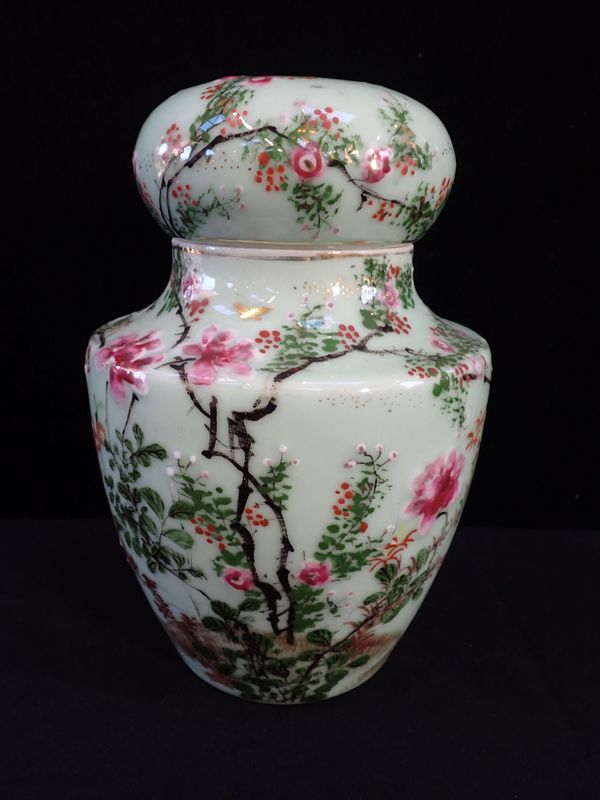 A CHINESE CELADON GLAZED JAR AND COVER