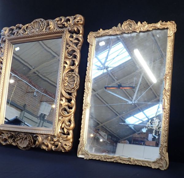 A ROCOCO STYLE GILT FRAME MIRROR