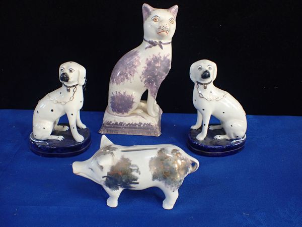 A PAIR OF STAFFORDSHIRE DALMATIANS