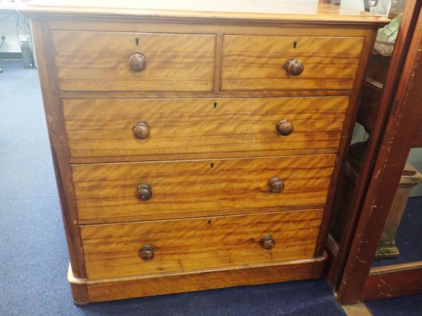 A VICTORIAN SATIN BIRCH CHEST OF DRAWERS