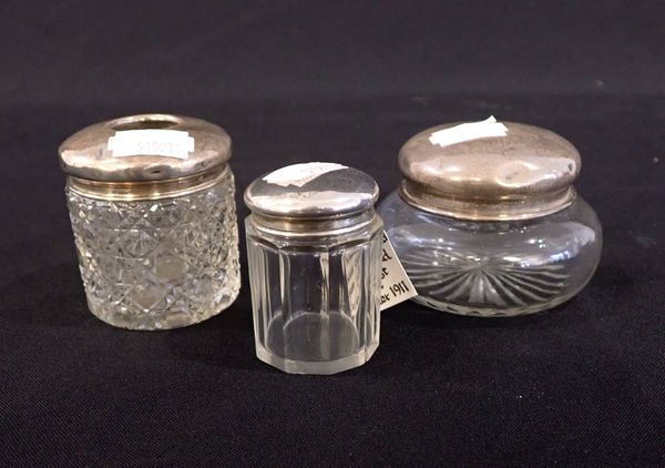 THREE SILVER TOPPED CUT GLASS DRESSING TABLE JARS