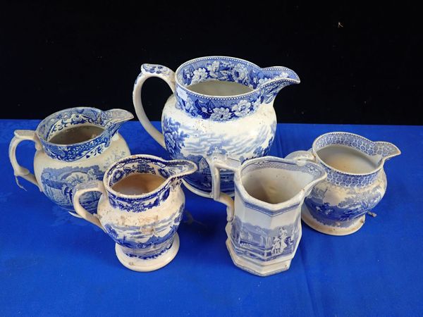 A COLLECTION OF EARLY VICTORIAN BLUE AND WHITE JUGS