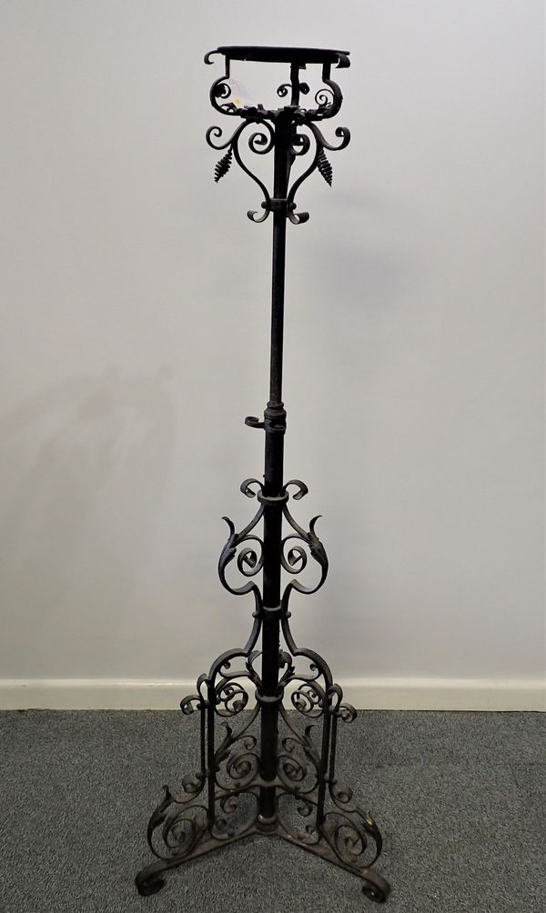 A 19TH CENTURY WROUGHT IRON TELESCOPIC OIL LAMP STANDARD