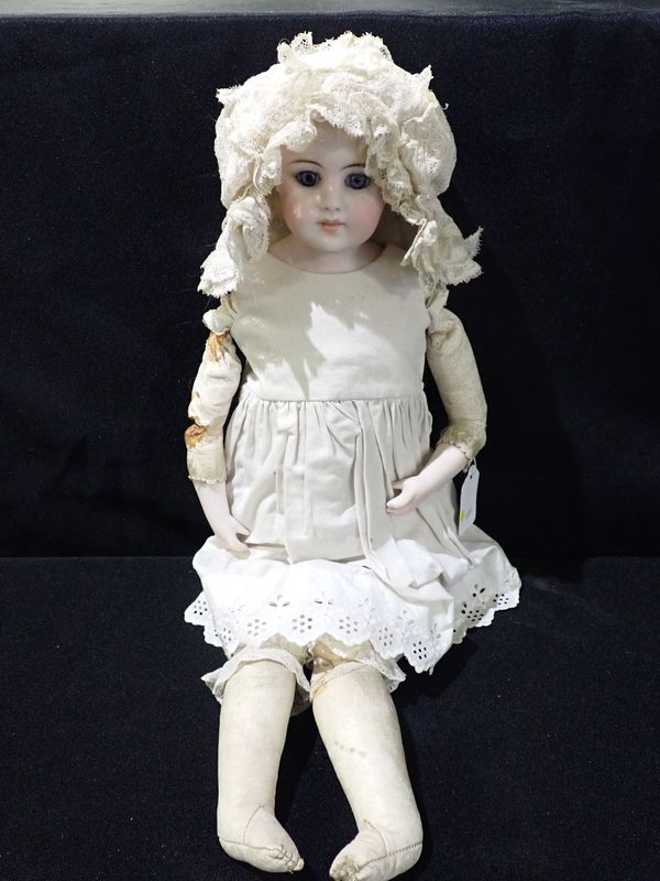 A BISQUE HEAD DOLL WITH KID LIMBS, IN THE STYLE OF JUMEAU