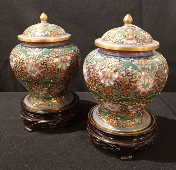 A PAIR OF CHINESE CLOISONNE COVERED JARS