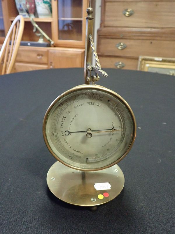 A VICTORIAN BRASS CIRCULAR ANEROID BAROMETER