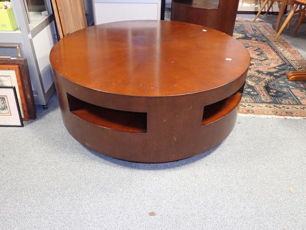 A MID CENTURY STYLE ELM FINISH CYLINDRICAL LOW COFFEE TABLE BY CRATE & BARREL