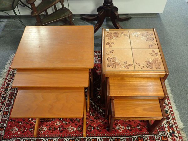 A NEST OF THREE MID CENTURY TEAK OCCASIONAL TABLES