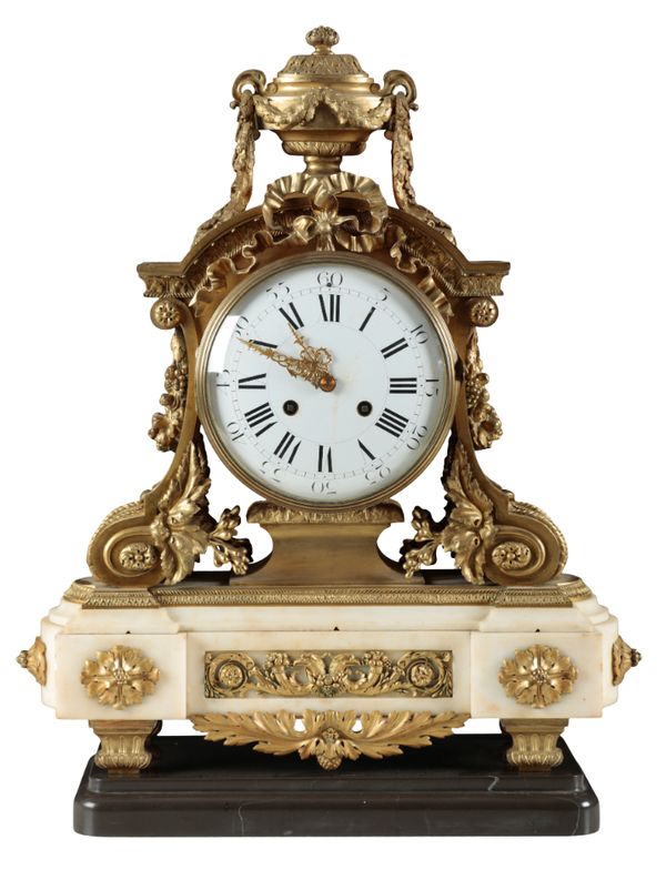 A 19TH CENTURY FRENCH GILT BRONZE AND MARBLE MANTLE CLOCK