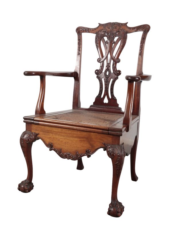 A GEORGE II STYLE COMMODE CHAIR IN THE MANNER OF THOMAS CHIPPENDALE