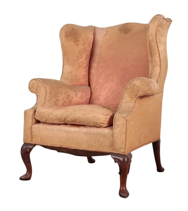 A GEORGE I STYLE MAHOGANY WING ARMCHAIR