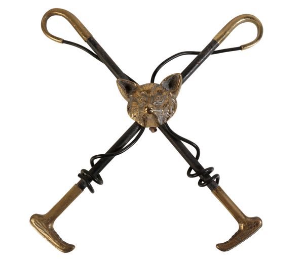 AN EDWARDIAN CAST IRON AND BRASS WHIP RACK