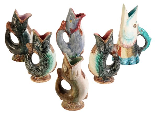 SIX VARIOUS MAJOLICA STYLE WATER JUGS