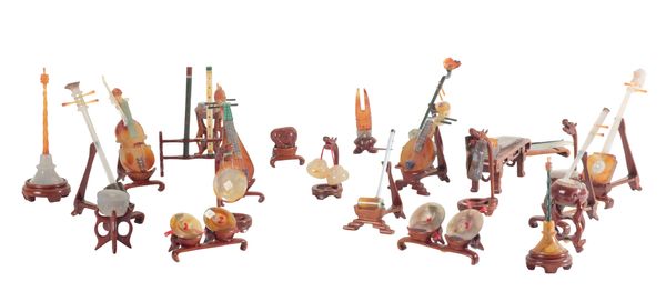 A MINIATURE SET OF CHINESE HARDSTONE INSTRUMENTS