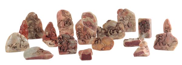 A GROUP OF EIGHTEEN CHINESE SOAPSTONE CARVINGS