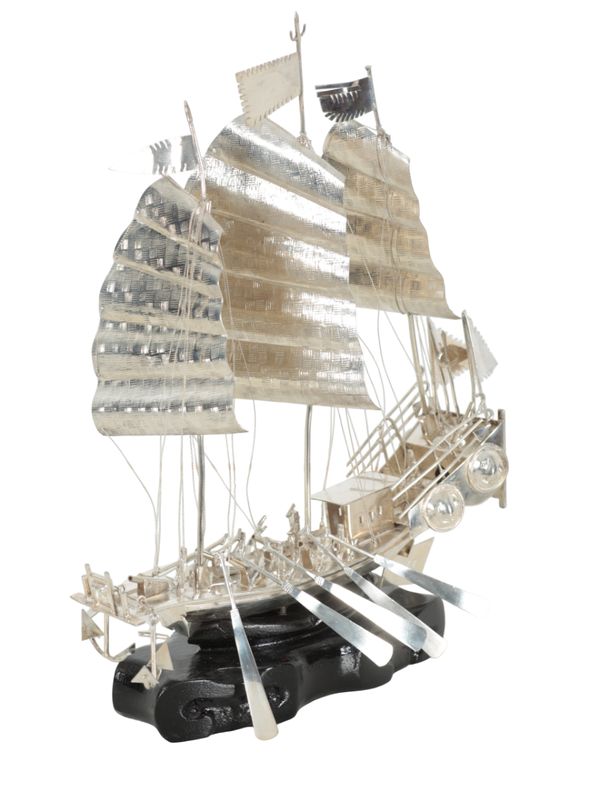 A CHINESE WHITE METAL MODEL OF A THREE MASTED JUNK